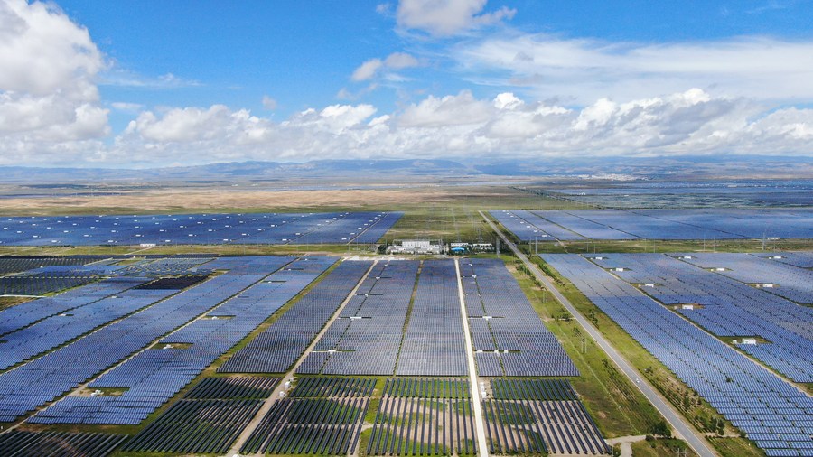 Aerial photo taken on Aug. 17, 2020 shows a photovoltaic power station, also a poverty-relief project, at the green industrial development park in the Tibetan Autonomous Prefecture of Hainan, northwest China's Qinghai Province. (Xinhua/Zhang Long) XxjwsmE007011 20210318 CBMFN0A003