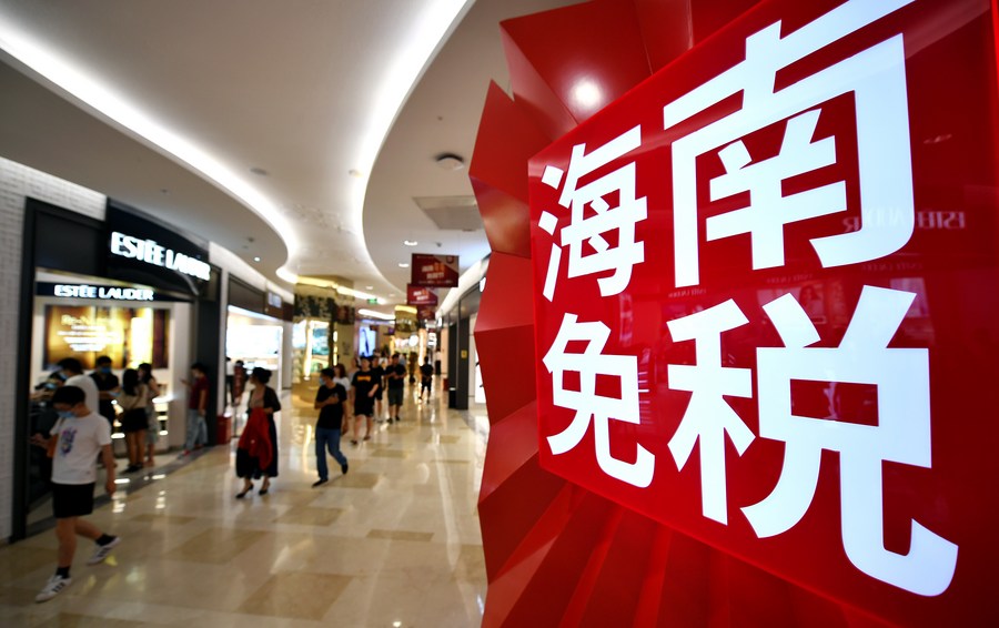 Customers shop at a duty-free shopping mall in Haikou, capital of south China's Hainan Province, June 29, 2020. (Xinhua/Guo Cheng) CbsbeeE007036 20210218 CBMFN0A003