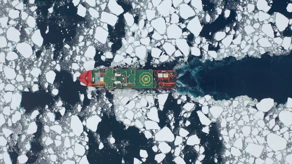 This aerial photo taken on Jan. 6, 2024 shows China's research icebreaker Xuelong 2 conducting scientific expedition in the Amundsen Sea. China's 40th Antarctic expedition team on Saturday successfully put a deep-water ecological submersible buoy in the Amundsen Sea. (Photo by Chen Dongbin/Xinhua)