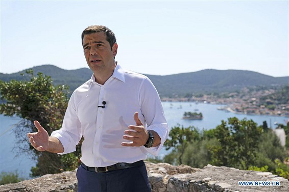 Greek PM announces end to bailouts, austerity
