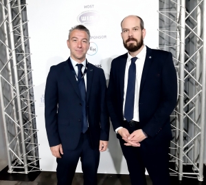 (&alpha;-&delta;) &Omicron; &Eta;&lambda;ί&alpha;&sigmaf; &Chi;&alpha;&tau;&zeta;&eta;&epsilon;&phi;&rho;&alpha;&iota;&mu;ί&delta;&eta;&sigmaf;, &pi;&rho;ό&epsilon;&delta;&rho;&omicron;&sigmaf; WIMA, &omicron; &kappa;&alpha;&pi;&tau;. &Mu;ά&rho;&iota;&omicron;&sigmaf; &Mu;&pi;&omicron;&upsilon;&gamma;&iota;&omicron;ύ&kappa;&alpha;&sigmaf;, Director l Logistics &amp; SCM Division and Business Development Manager l Shipping Department &tau;&omicron;&upsilon; BCA