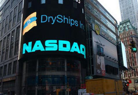 Dryships exercises first option to acquire a very large gas carrier with a 5 year time charter attached to an oil major