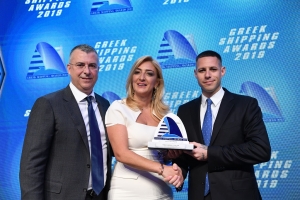 Paillette Palaiologou of sponsor Bureau Veritas presenting the Tanker Company of the Year Award to Paris Kassidokostas-Latsis (right) and George Margaronis of Latsco Shipping. 