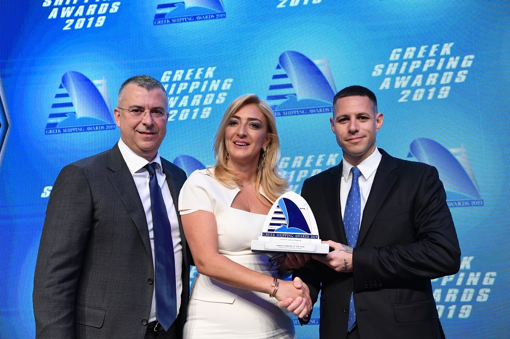 Paillette Palaiologou of sponsor Bureau Veritas presenting the Tanker Company of the Year Award to Paris Kassidokostas-Latsis (right) and George Margaronis of Latsco Shipping. 