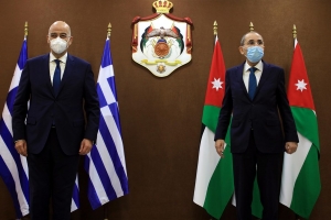 Jordanian Foreign Minister Ayman Safadi (R) meets with his Greek counterpart Nikos Dendias in Amman, Jordan, on May 18, 2021. (Photo by Mohammad Abu Ghosh/Xinhua)