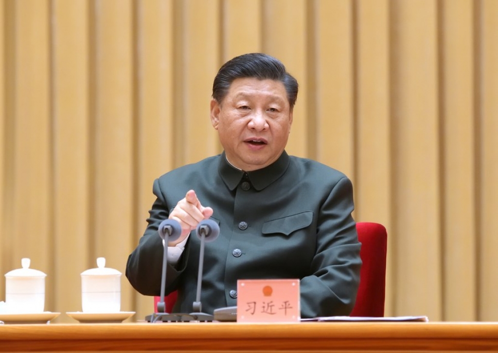 Chinese President Xi Jinping speaks when attending a plenary meeting of the delegation of the People's Liberation Army and People's Armed Police Force at the fourth session of the 13th National People's Congress (NPC) in Beijing, capital of China, March 9, 2021. (Xinhua/Li Gang)