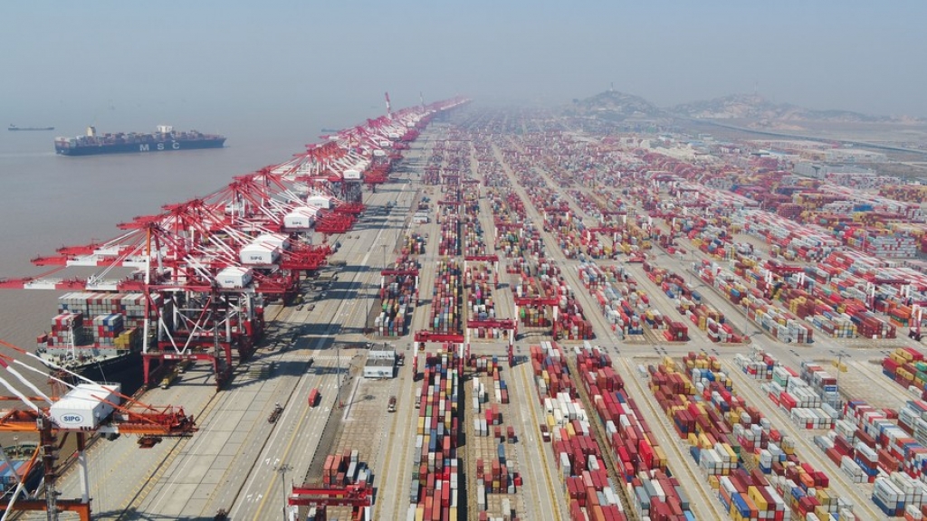 Aerial photo taken on March 18, 2020 shows the container dock of Shanghai's Yangshan Port, east China.  (Xinhua/Ding Ting)