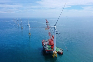This aerial photo taken on June 28, 2023 shows a 16-megawatt wind turbine installed at the Fujian offshore wind farm operated by the China Three Gorges Corporation off the coast of southeast China's Fujian Province. (Xinhua/Lin Shanchuan)