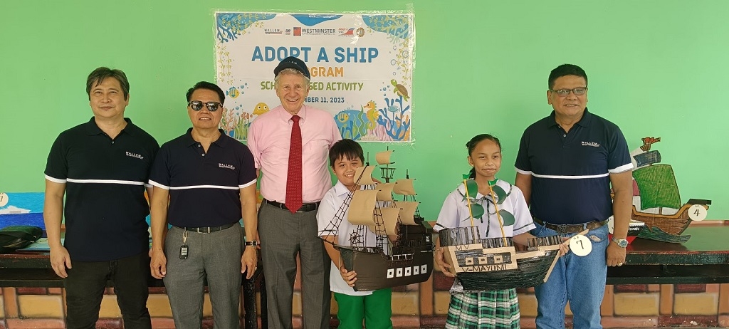 Wallem Westminster&rsquo;s senior officers raising awareness through the Adopt a Ship initiative Children at SAES, Manila display their Adopt a Ship certificates Wallem logo