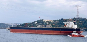 The capesize Ocean Compass, seen here crossing the Bosphorus, fetches top dollar in a secondhand sale.Photo: Dursun Cam/MarineTraffic