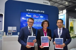 (l-r) Thomas Hansen, Director, Head of Promotion &amp; Customer Support, for MAN, Dr. Xioazhi (Christina) Wang, ABS Vice President, Global Marine, and Mr. Zhiyong Zhou, SDARI Vice President, at signing of joint development project for a low-emission, ammonia-fueled containment vessel.  